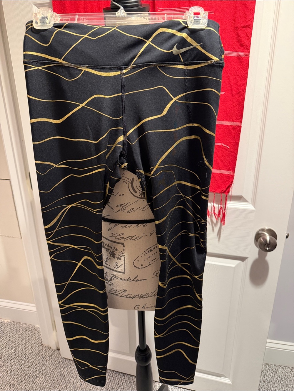 Nike Running Black Leggings with Gold Wave Design. Very supporting & drawstrings